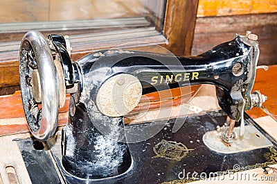 Black Old vintage singer sewing machine in close up. Editorial Stock Photo